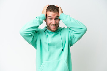 Young handsome caucasian man isolated on white background doing nervous gesture