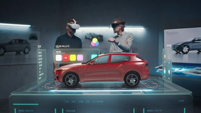Two development engineers choose a color for a future eco-friendly sustainable electric car prototype. Using virtual reality headset and hologram. Cutting edge technology. Car design developers.