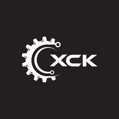 XCK letter technology logo design on black background. XCK creative initials letter IT logo concept. XCK setting shape design.
