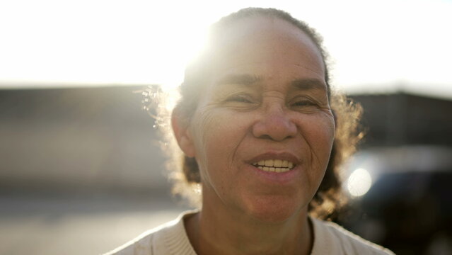 Happy Mature Hispanic Senior Woman Portrait Face Closeup Smiling At Camera. South American Latina Older Female Person