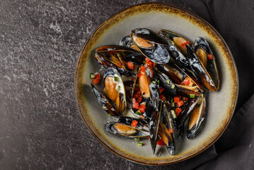mussels with shells in tomato sauce