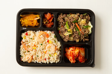 Various side dishes and bulgogi lunch box