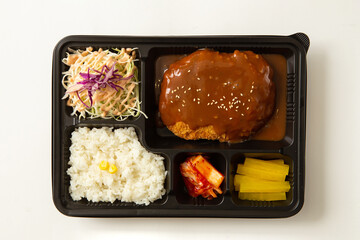Various side dishes and hamburg steak lunch box