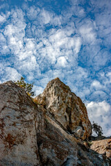 View from below to the top of Mount Ai-Petri. Unforgettable landscape on the top of Mount Ai-Petri. The stones are perfectly combined with the blue summer sky.