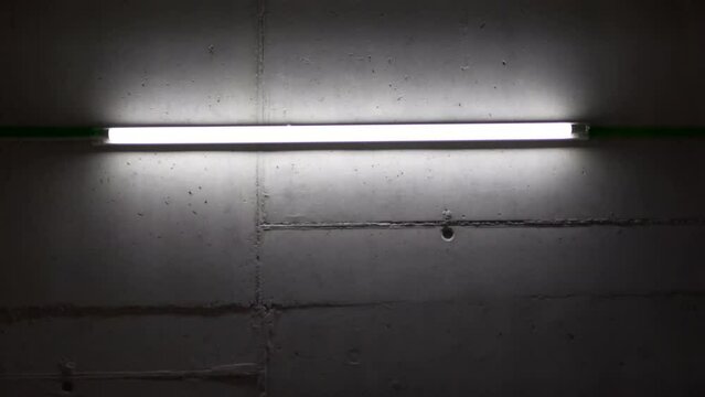 White fluorescent flickering and flashing inside a building