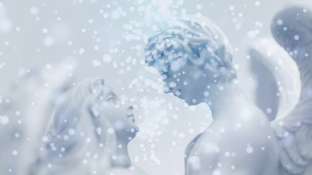 Two angels archangels with falling snowflakes and lights like romantic peace winter and angelic love concept 