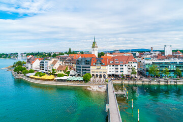Obraz premium Germany, Friedrichshafen city coast of bodensee lake houses promenade lakeside in summer, aerial panorama view above buildings