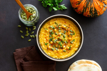 Pumpkin hummus with seeds and greens. Healthy eating. Vegetarian food.