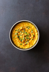 Pumpkin hummus with seeds and greens. Healthy eating. Vegetarian food.