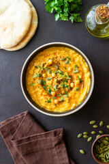 Pumpkin hummus with seeds and greens. Healthy eating. Vegetarian food.