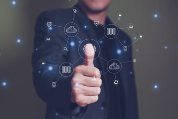 Businessman use biometric finger scan that can access to cloud computing unit that can access to business and customer database to create marketing campaign.