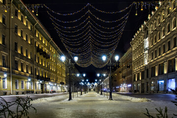 Fototapeta na wymiar New Year's illumination on the streets of St. Petersburg.