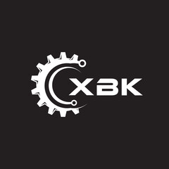 XBK letter technology logo design on black background. XBK creative initials letter IT logo concept. XBK setting shape design.
