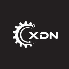 XDN letter technology logo design on black background. XDN creative initials letter IT logo concept. XDN setting shape design.
