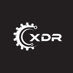 XDR letter technology logo design on black background. XDR creative initials letter IT logo concept. XDR setting shape design.
