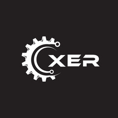XER letter technology logo design on black background. XER creative initials letter IT logo concept. XER setting shape design.
