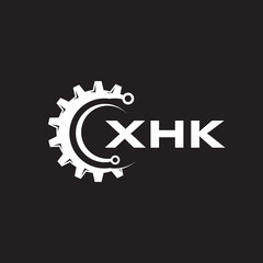 XHK letter technology logo design on black background. XHK creative initials letter IT logo concept. XHK setting shape design.
