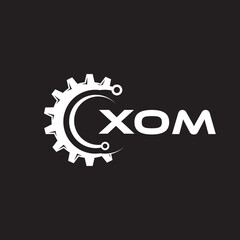 XOM letter technology logo design on black background. XOM creative initials letter IT logo concept. XOM setting shape design.
