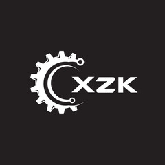 Obraz premium XZK letter technology logo design on black background. XZK creative initials letter IT logo concept. XZK setting shape design. 