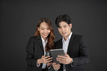 The two young businessmen stood to talk about their business.