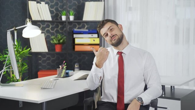 Exercises that can be done in the office. Neck exercise.
Office worker showing exercises that can be done in the office.
