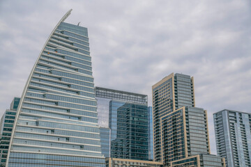 Cityscape with modern residential and corporate buildings views from Butler Metro Park- Austin, TX