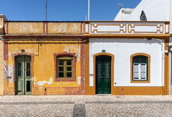 Portugal, Aug 2022: Traditional houses of Algarve, south of Portugal