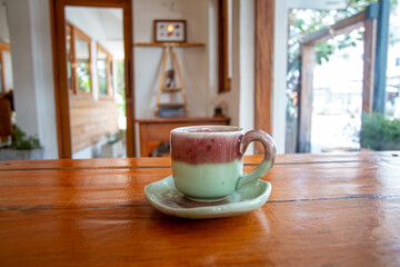 Coffee and a beautiful mug go well with good taste.