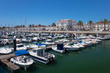 Fototapeta na wymiar Portugal, August 2022: Marina harbor and hotel Guadiana at Vila Real de Santo António, Algarve, Portugal