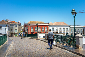Portugal, August 2022: Roman bridge at Tavira the Venice of the Algarve, Algarve, Portugal