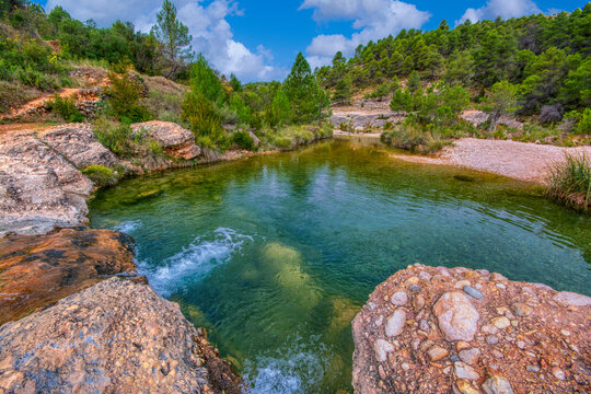 Natural lagoon in the Ulldemo river in the natural area of La Pesquera in Beceite, Teruel,