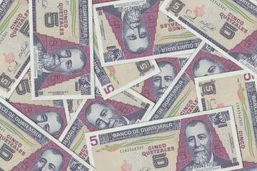 Fototapeta na wymiar Paper money from Guatemala. Guatemalan quetzal. Close up banknotes from Guatemala. Guatemalan currency 