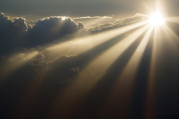 sun rays and clouds