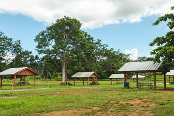 Fototapeta na wymiar Multiples zinc roof wooden pavilion outdoor landscape from puerto rico public parks and fields panorama