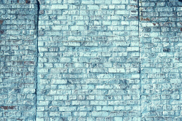 Brick wall with unusual blue bricks
