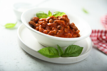 Homemade Bolognese sauce with fresh basil