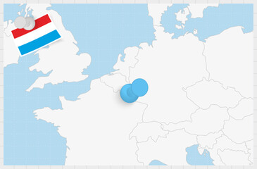 Map of Luxembourg with a pinned blue pin. Pinned flag of Luxembourg.