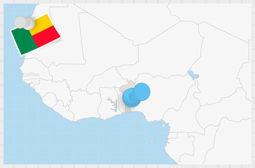 Map of Benin with a pinned blue pin. Pinned flag of Benin.