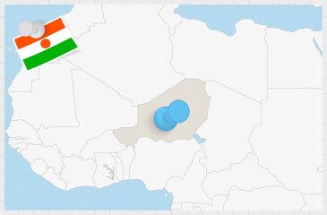 Map of Niger with a pinned blue pin. Pinned flag of Niger.