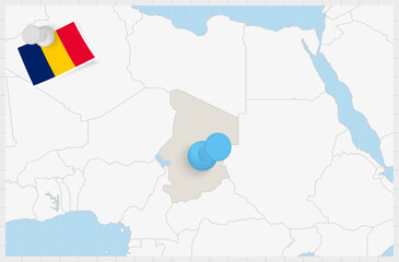 Map of Chad with a pinned blue pin. Pinned flag of Chad.