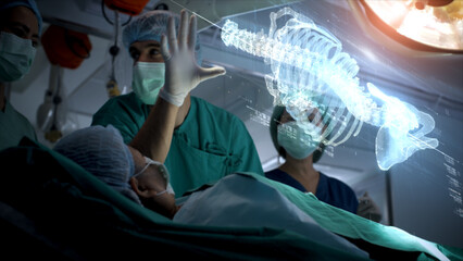 Futuristic biomedical concept of a doctor using advance holographic scanning a patient's backbone...