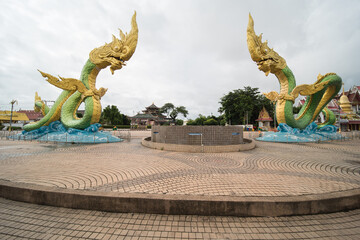 The Naga Statue in Nong Khai, Thailand. the landmark of the town at the mekong promenade.
 - obrazy, fototapety, plakaty