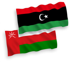 Flags of Sultanate of Oman and Libya on a white background