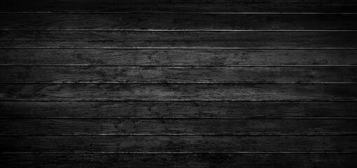 Black wooden background or texture