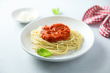 Spaghetti with tomato sauce and basil