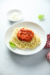 Spaghetti with tomato sauce and basil