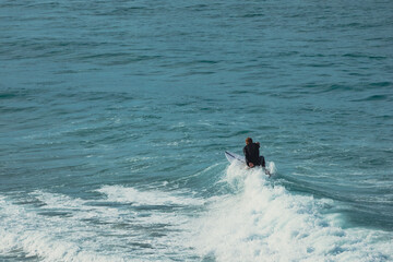 Surfer riding a wave