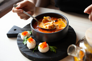 tom yum soup restaurant served