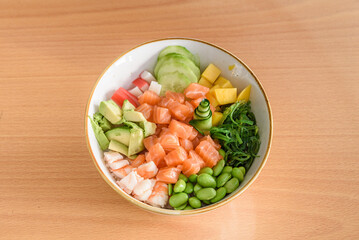 a fresh poke with salmon on a bowl