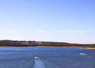 Boaters taking advantage of a beautiful fall day on Norfork Lake in Mountain Home, Arkansas 